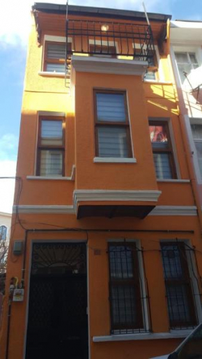 Orange triplex house Balat